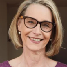 Verified buyer Maddison Allen smiling while experiencing profound cognitive tranquility and relief from chronic auditory disruptions.
