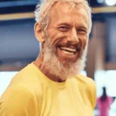 Photographic testimonial of Jake Austin documenting successful long-term management of neurological buzzing sensations through targeted nutrition.